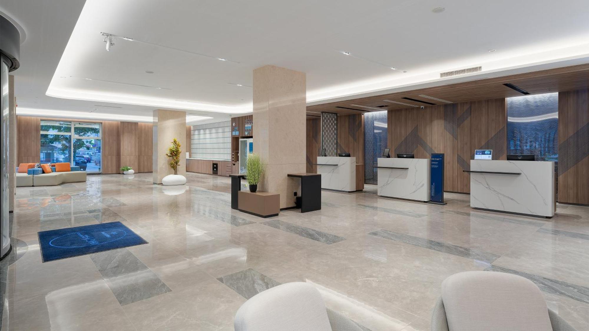 Holiday Inn Express Qingdao Shibei By Ihg Экстерьер фото